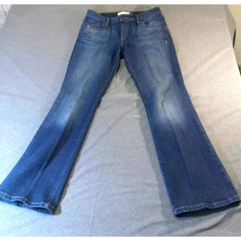Levis Jeans 545 Womens Size 10 34x31 Low Boot Cut Stretch Button Flap Pockets